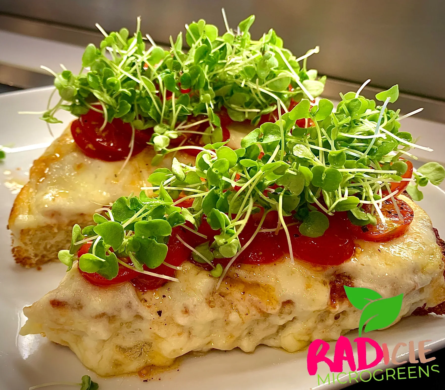 Prepared entrée generously topped with broccoli microgreens